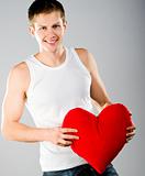 Young man with red heart