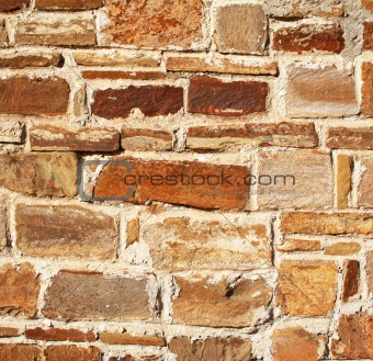 Abstract old colorful stone wall as background 