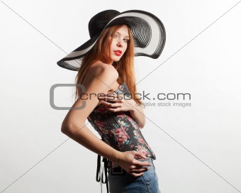 girl in a broad-brimmed hat