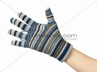 hand in a blue woollen glove on a white background