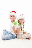 Christmas kids with candy on stick