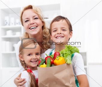 Happy family with the groceries