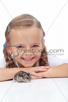 Little girl and her hamster