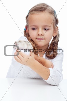 Wait you little devil - little girl and her hamster
