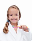 Little girl washing teeth - oral hygiene