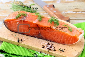 Piece of smoked salmon with dill