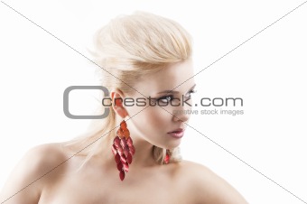 red earring on cute blond girl, in front of the camera with a he