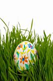 Painted easter egg in grass