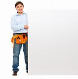 Happy construction worker holding blank billboard
