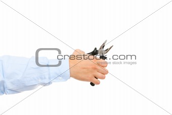 Hand holding pliers
