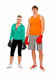 Portrait of fit young woman and man in boxing gloves isolated on white

