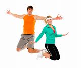 Fitness girl and man in sportswear jumping isolated on white
