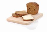 sliced rye bread with sandwich on a chopping board isolated on w