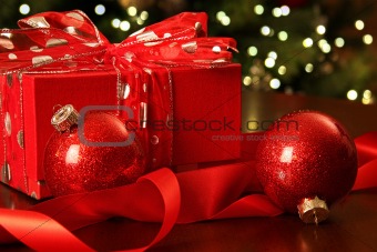 Red christmas gift with ornaments 