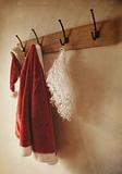 Santa costume hanging on coat rack