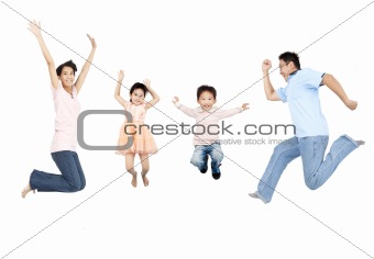 happy asian family jumping together