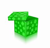 Green open gift box with shamrocks