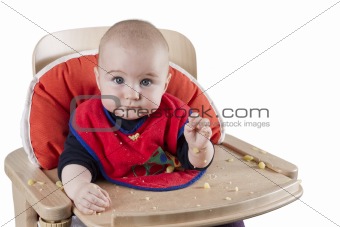 toddler eating potatoes