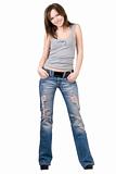Beautiful young woman in a blue jeans. Isolated