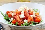 Greek Mediterranean salad with feta cheese, olive oil and tomato