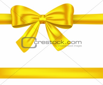 Golden ribbons with bow on white
