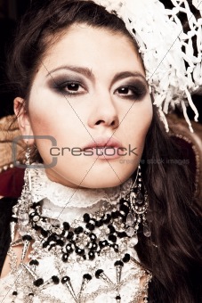 Glamour portrait of a girl in jewelry