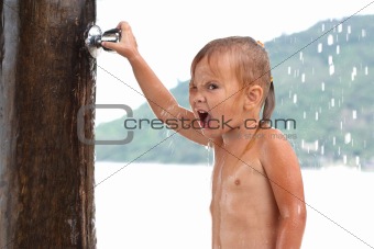 small girl under shower