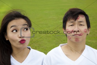 Happy Valentine's Day. asian couple with funny kiss