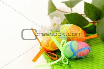 The Easter composition eggs,  green grass over white