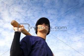 young baseball player with bat