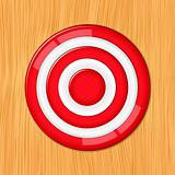 Red target on the wooden wall