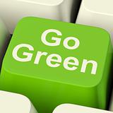 Go Green Computer Key Showing Recycling And Eco Friendly
