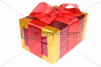 Present with red ribbon isolated on white background