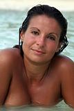 Nude Brunette Woman in Ocean Water