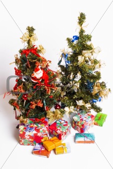 Christmas trees and presents on white