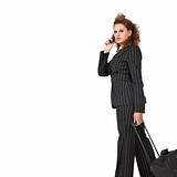 Businesswoman pulling her luggage
