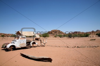 wreck - old car in the desert