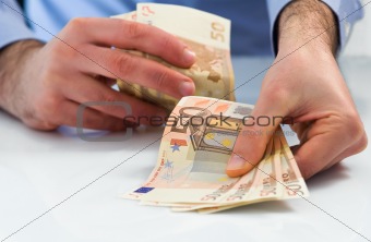 Man handling money.