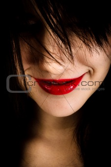 Closeup photo of a girl with a grin on her face