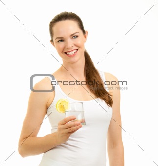 Beautiful woman holding glass of water