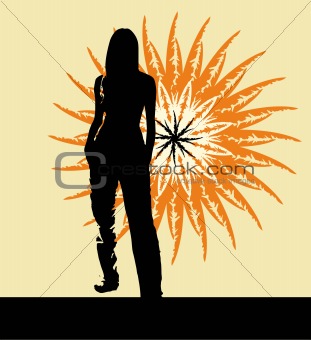 Silhouette of the girl standing on a background of the sun