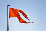 fluttering in breeze Hindu temple iconic saffron flag