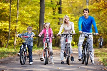 Families with children on bicycles