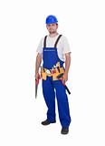 Handyman or construction worker standing with lots of tools