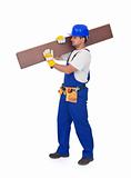 Handyman or worker carrying wooden laminate flooring