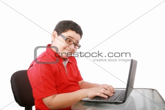 young boy with computer isolated on white