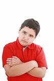 serious little boy with hands folded standing isolated on white