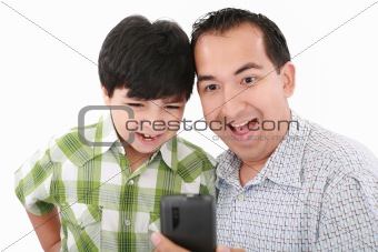 Young father and son was surprised, having read on mobile phone