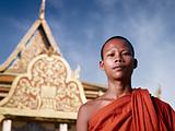 Portrait of buddhist monk near temple, Cambodia, Asia