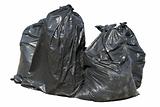 Black British bin bags, isolated on a white background.